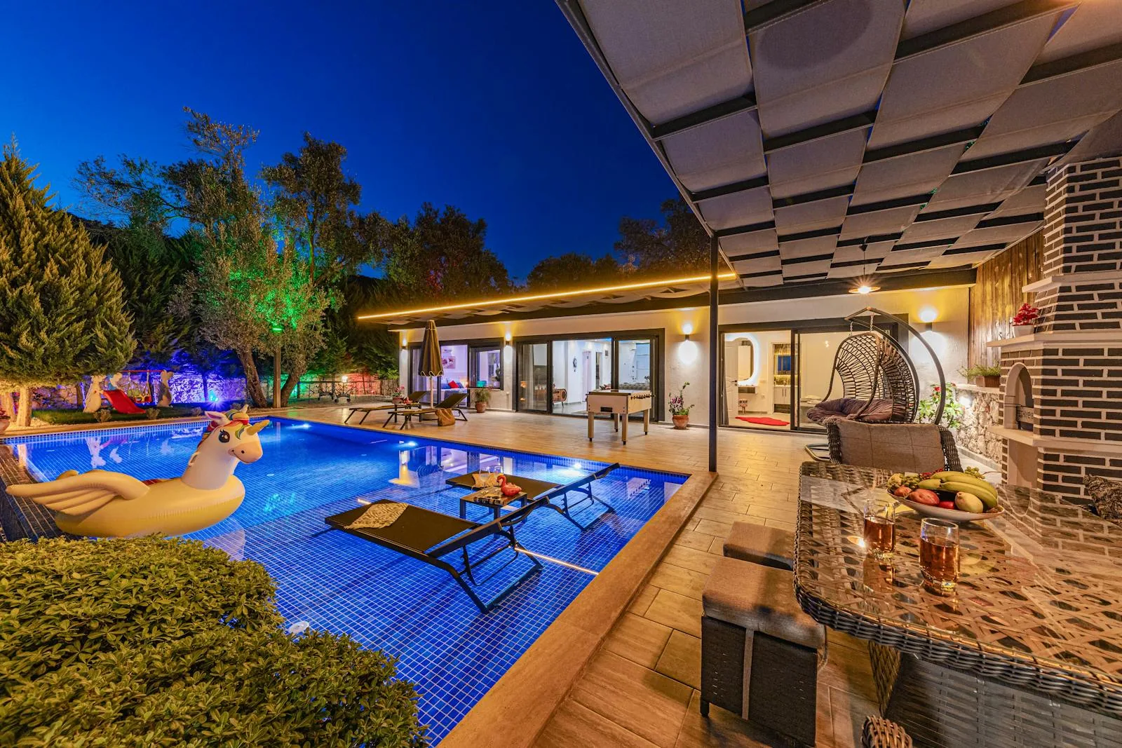 Private villa swimming pool in the Algarve Portugal with blue water and sunny terrace