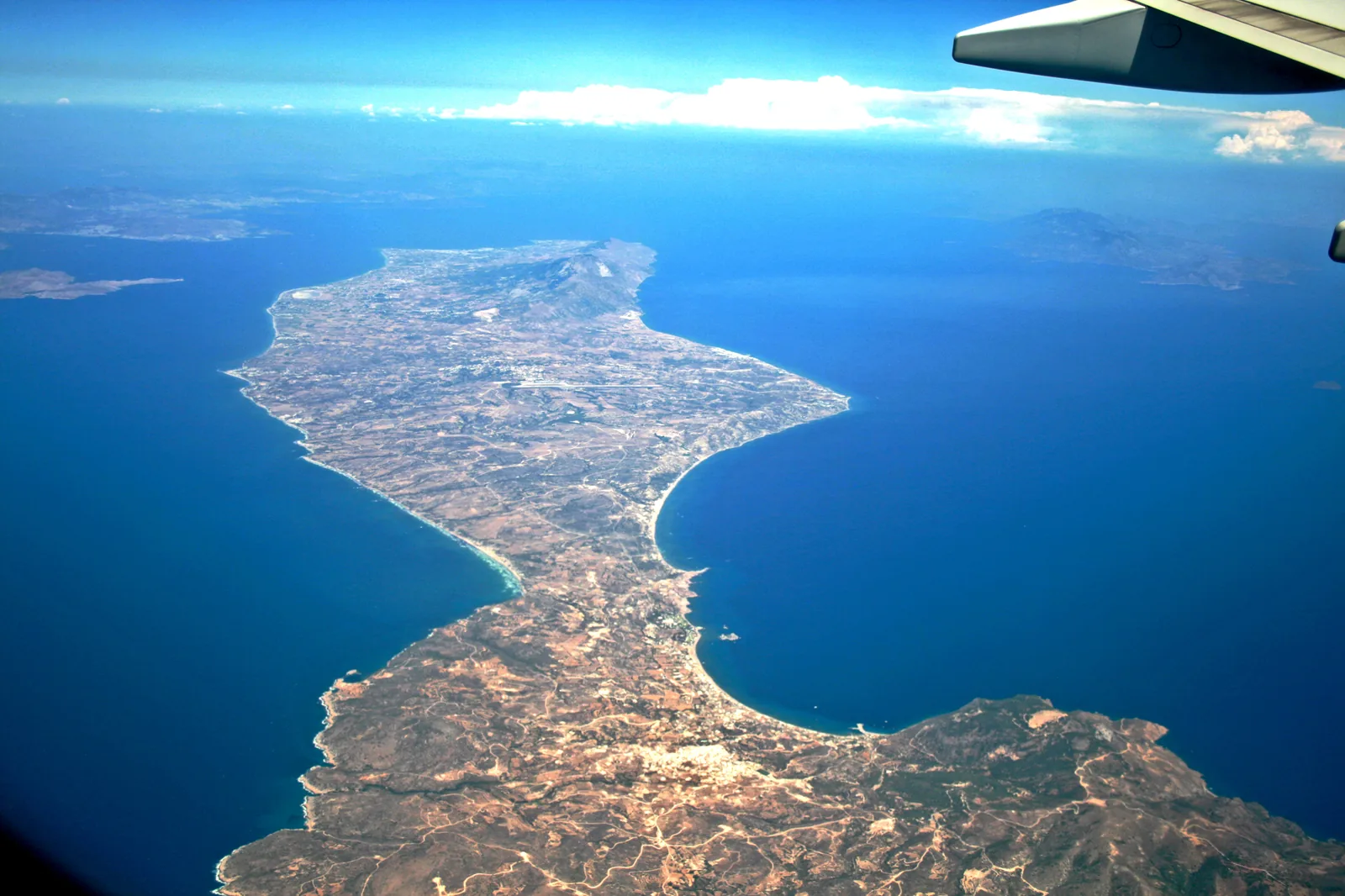Aerial view of Kos island, Greece, from an aircraft — the island offers some of the best value all-inclusive holidays with private pool accommodation