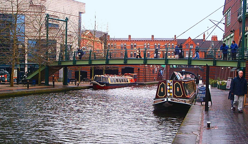 Brindleyplace canal area in Birmingham city centre with narrowboats, near where several of the city's best pools are located