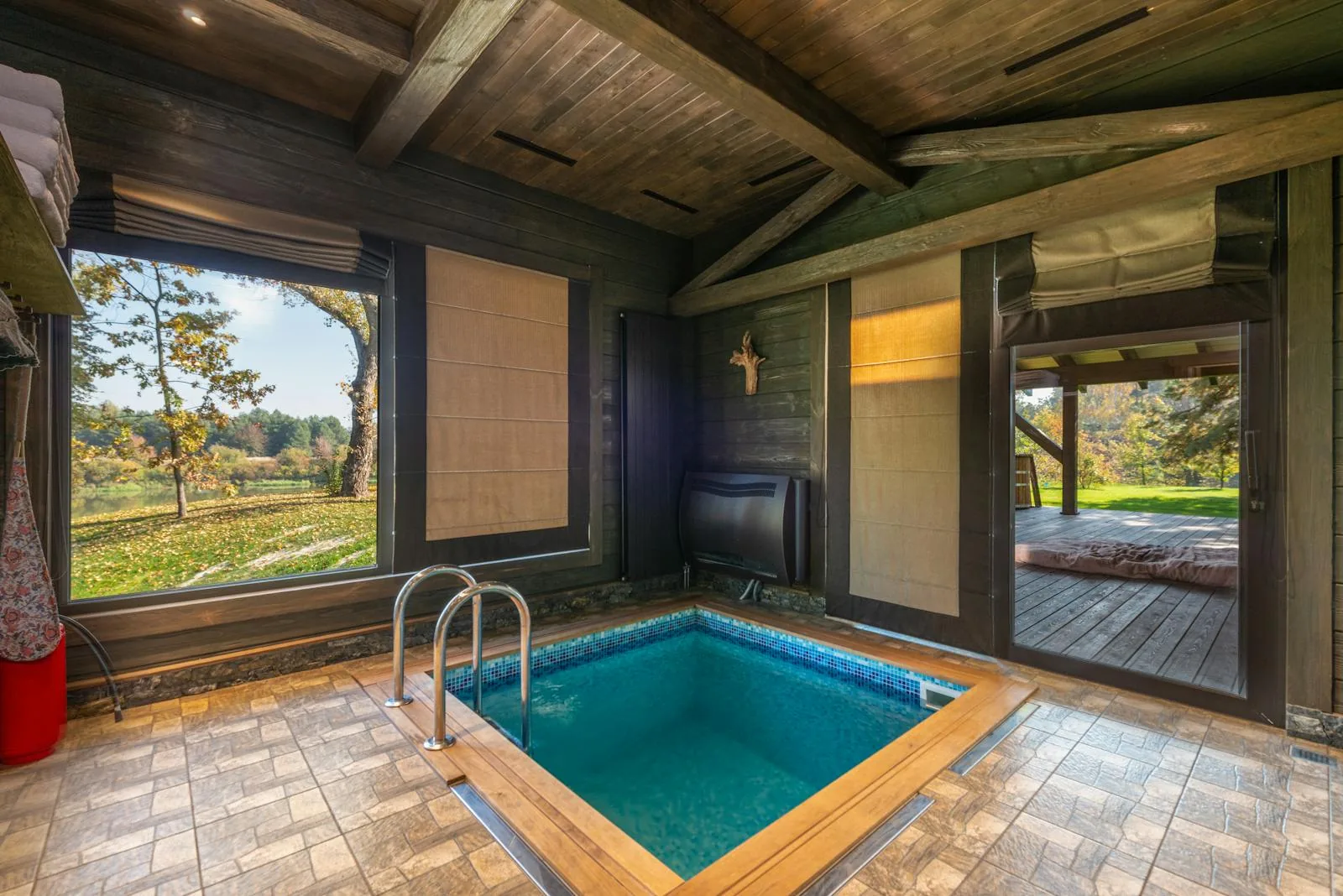 Small private warm indoor pool with easy step entry typical of a UK hydrotherapy pool