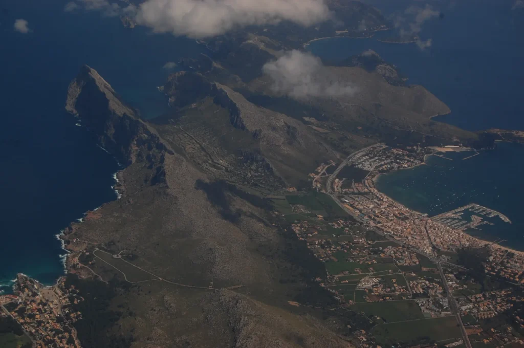 Aerial view of Boquer Valley and Puerto Pollensa in Mallorca, Spain, showing Mediterranean coastline and mountain landscape