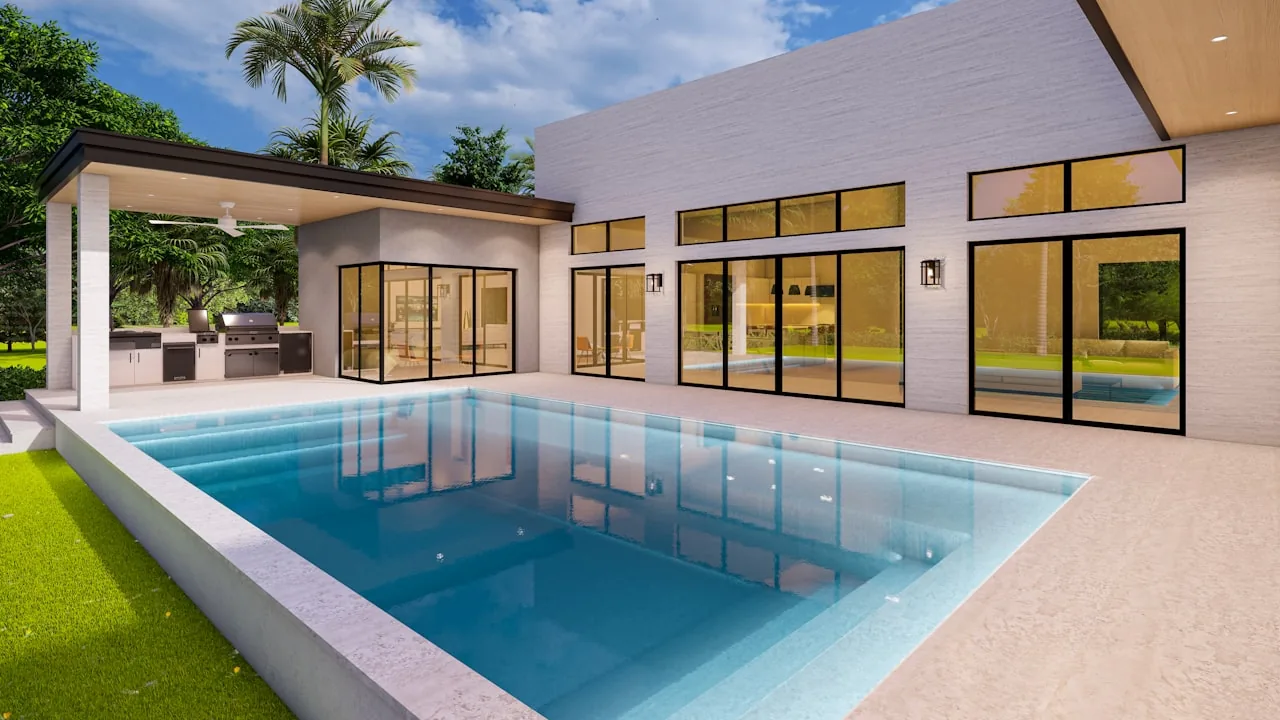 A luxury modern home with a large rectangular inground swimming pool and stone patio terrace representing planning permission requirements and running costs when choosing a swimming pool type for a UK house